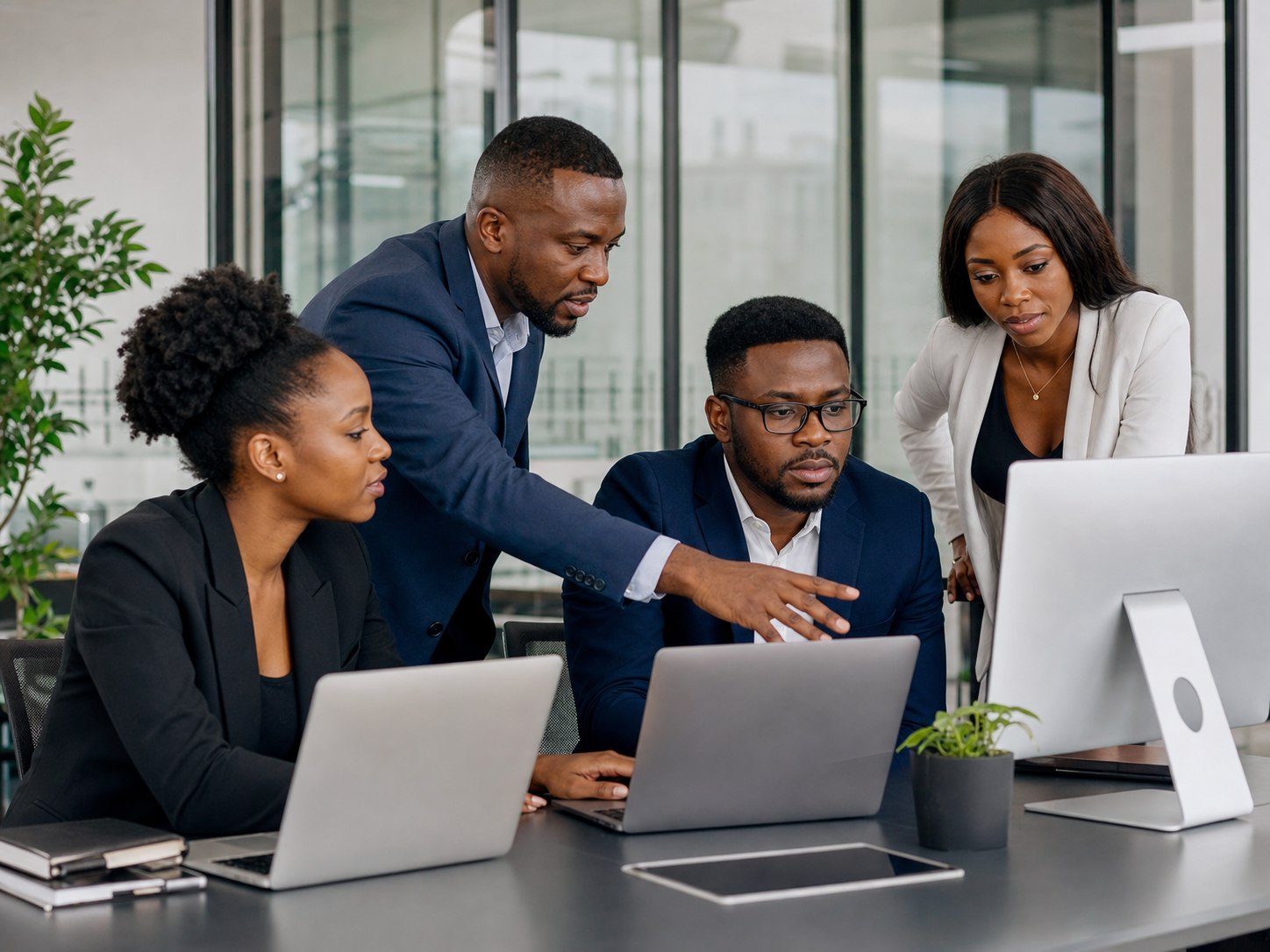 African technology professionals collaborating in a modern office